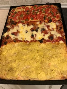 pizza cotta su forno a legna